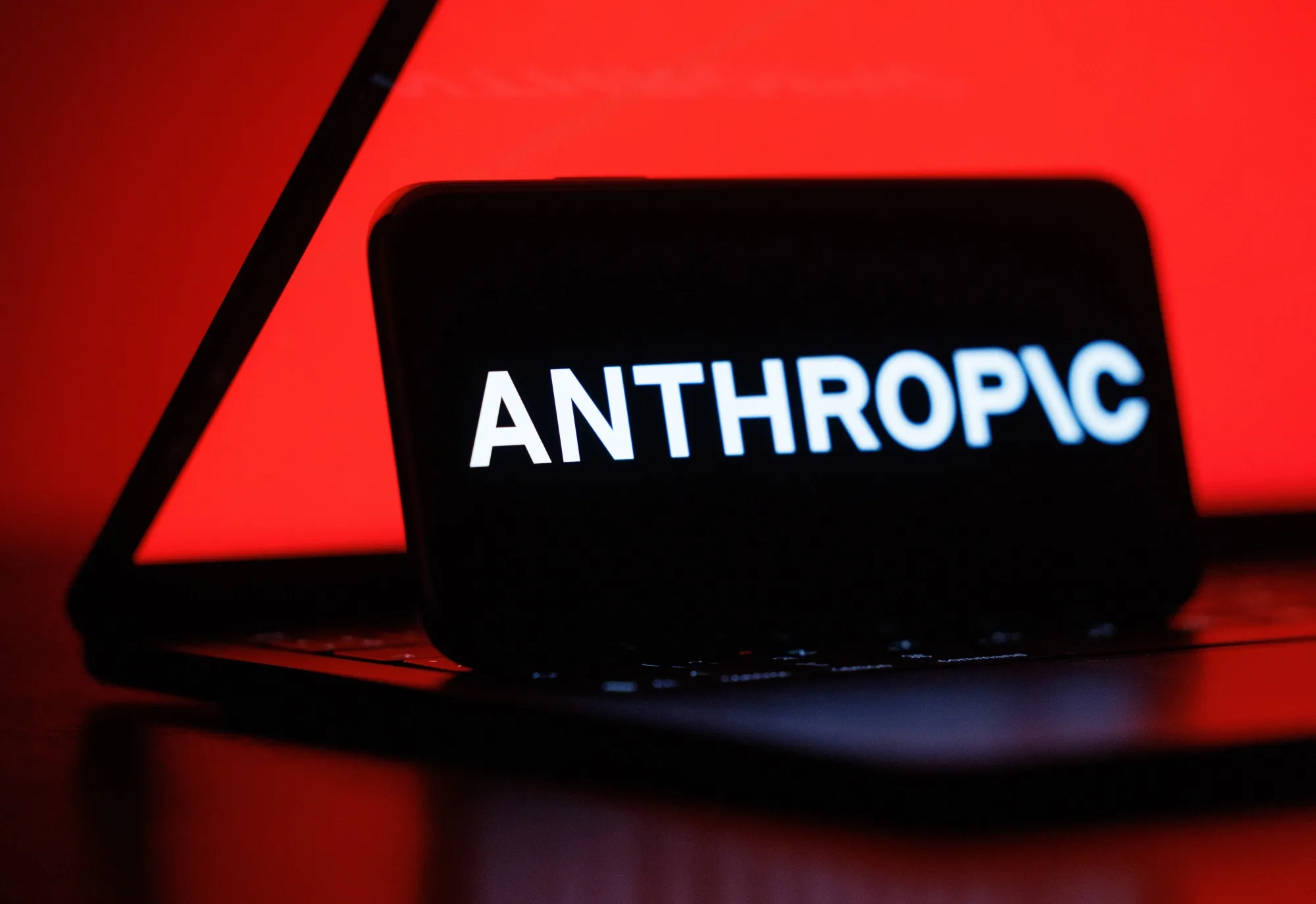 A phone displaying the Anthropic logo