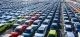 Rows of Chinese electric vehicles at a port awaiting export