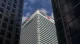 HSBC tower with logo seen from below between two other skyscrapers
