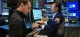 Traders work on the floor of the New York Stock Exchange